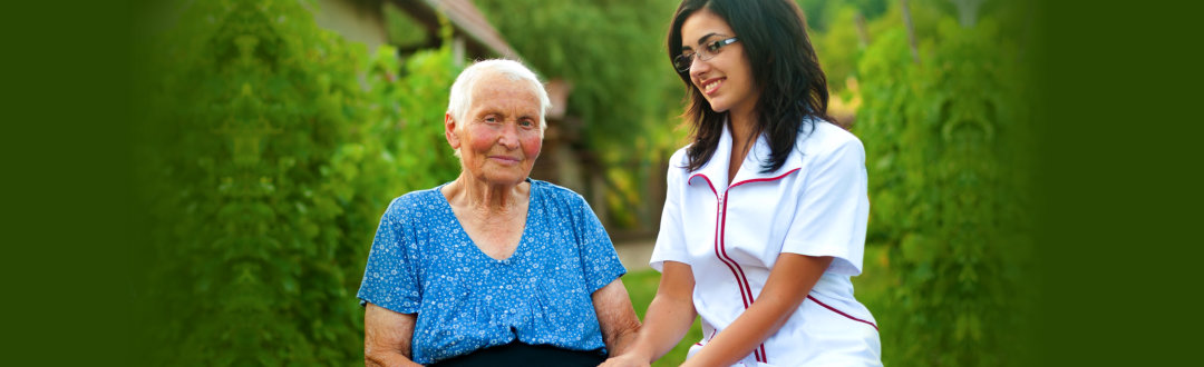 old woman with her caregiver